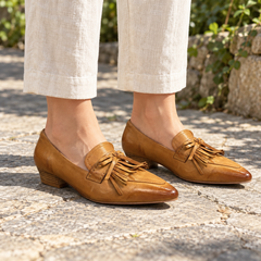 Tan Horse Leather Pointed-Toe Tassel Loafers on foot