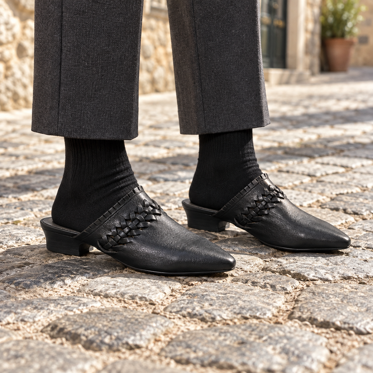Black Horse Leather Woven-Trim Pointed-Toe Mules on foot
