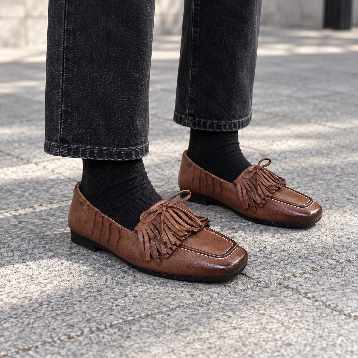 Brown Horse Leather Tassel Loafers on foot