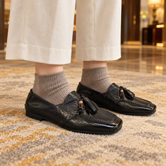Black Horse Leather Tassel Loafers on foot