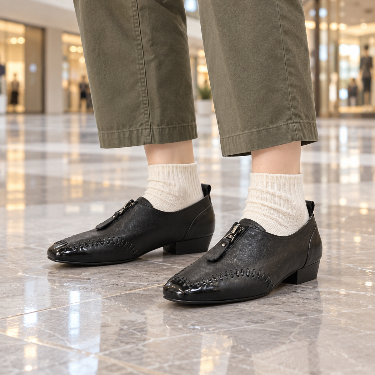 Black Horse Leather Zip-Front Whipstitch Shoes on foot