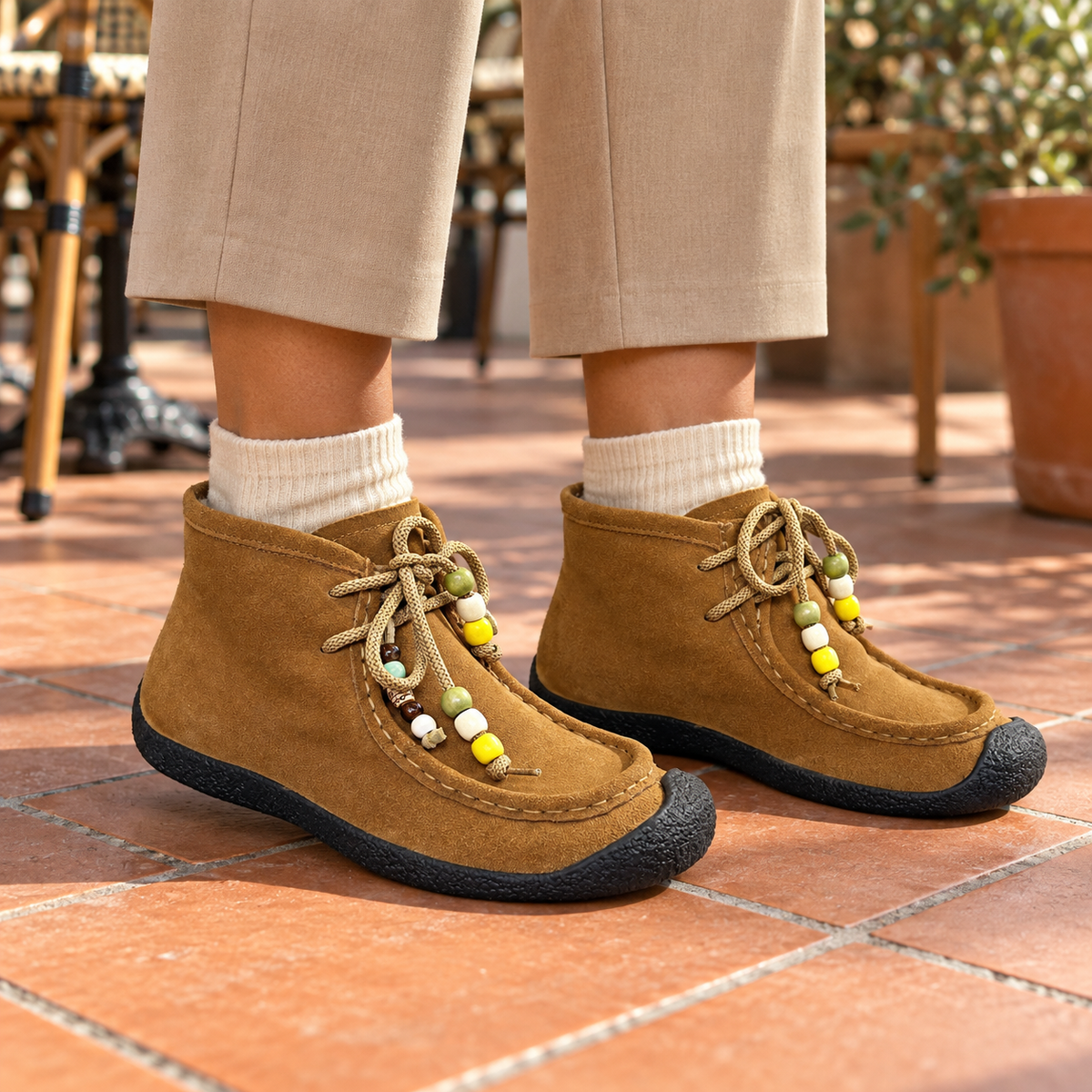 Tan Cow Suede Shearling-Lined Beaded Moc-Toe Boots on foot