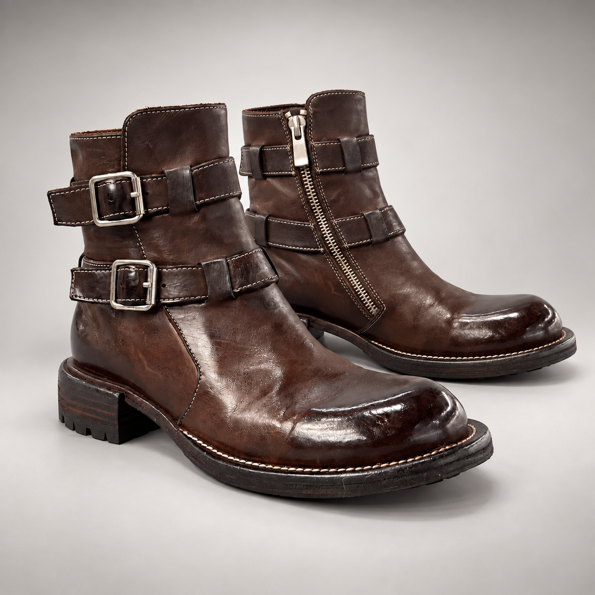 Dark brown washed horse leather double-buckle ankle boots, pair
