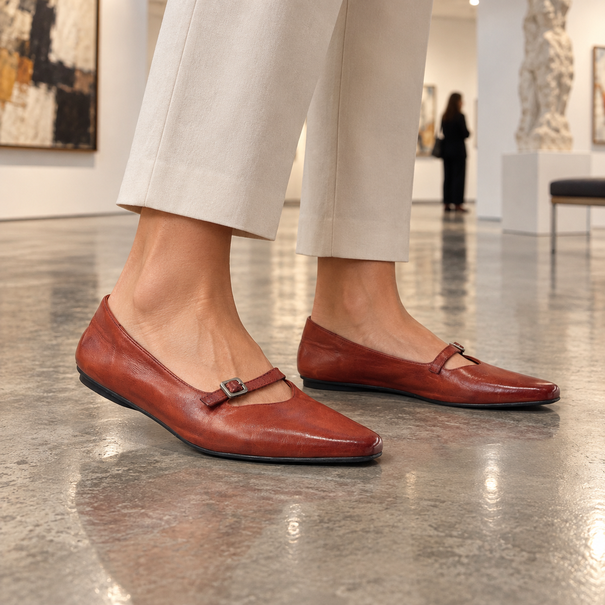 Red Mary Jane flats worn on feet