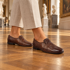 Brown shoes worn on feet