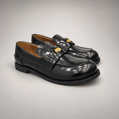 Black top-grain cow leather emblem loafers, pair