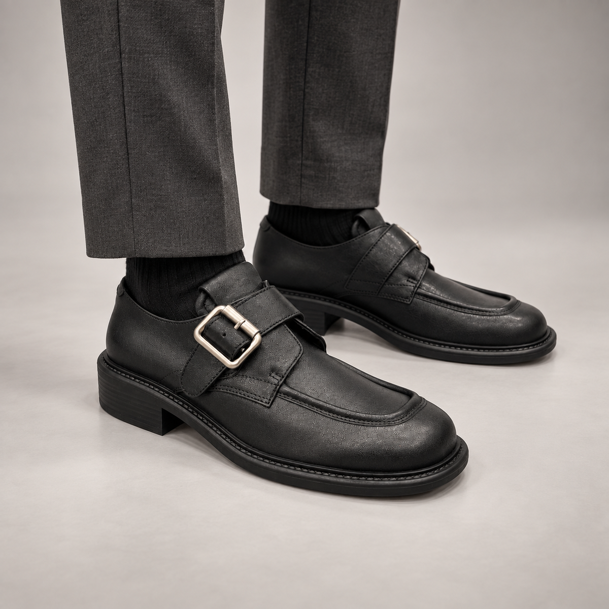 Black Leather Oversized-Buckle Moc-Toe Shoes worn on foot