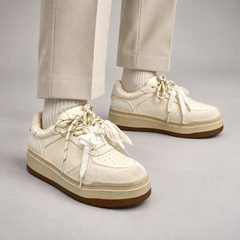 Cream Leather Chunky Lace-Up Sneakers worn on foot