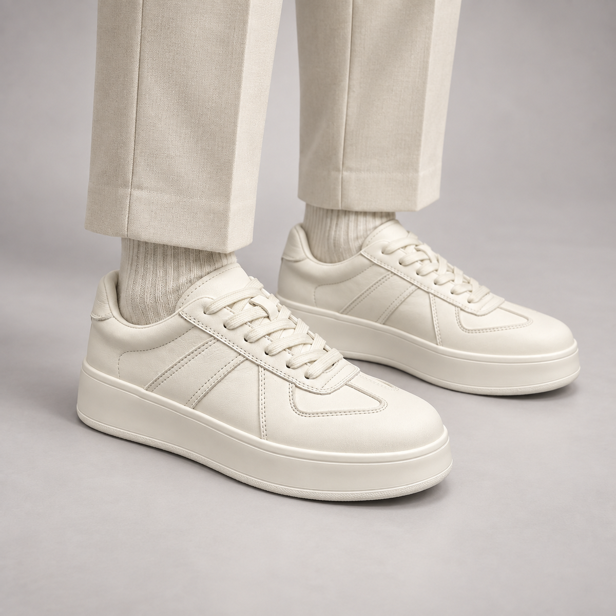 White Leather Lace-Up Platform Sneakers worn on foot