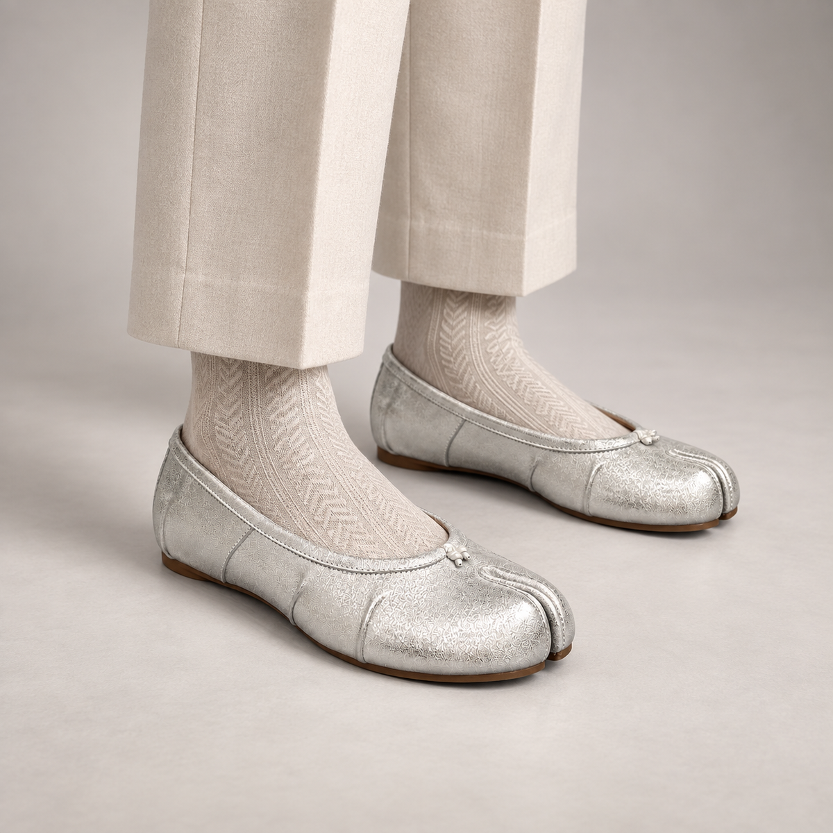 Silver Leather Split-Toe Bow Ballet Flats worn on foot