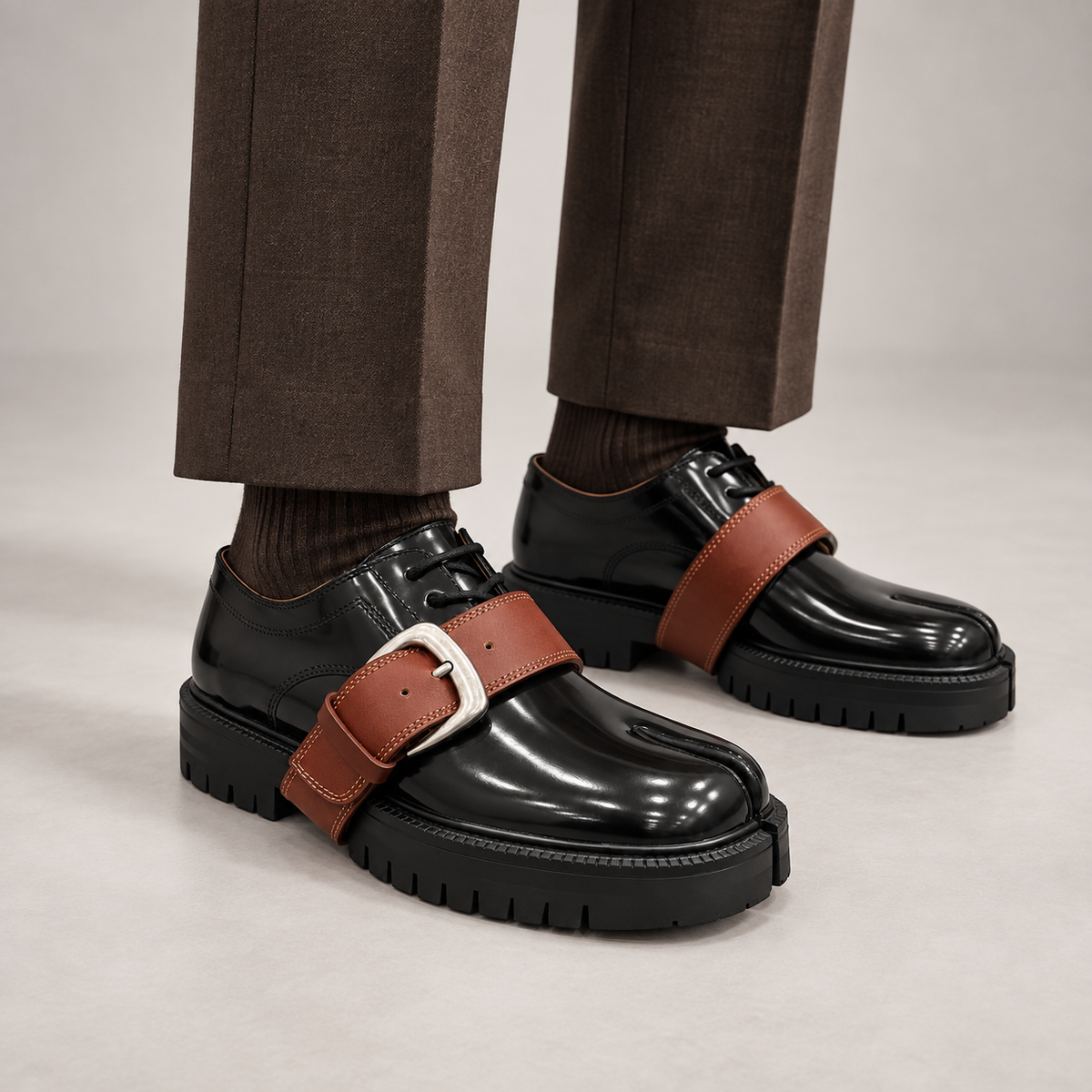 Black Patent Leather Split-Toe Platform Buckle Shoes worn on foot