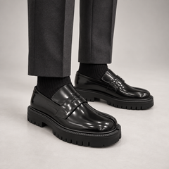 Black Patent Leather Split-Toe Platform Loafers worn on foot