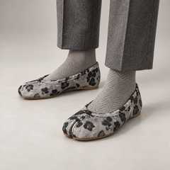 Gray and Black Animal-Print Split-Toe Ballet Flats worn on foot