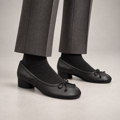 Black Leather Split-Toe Bow Block-Heel Flats worn on foot