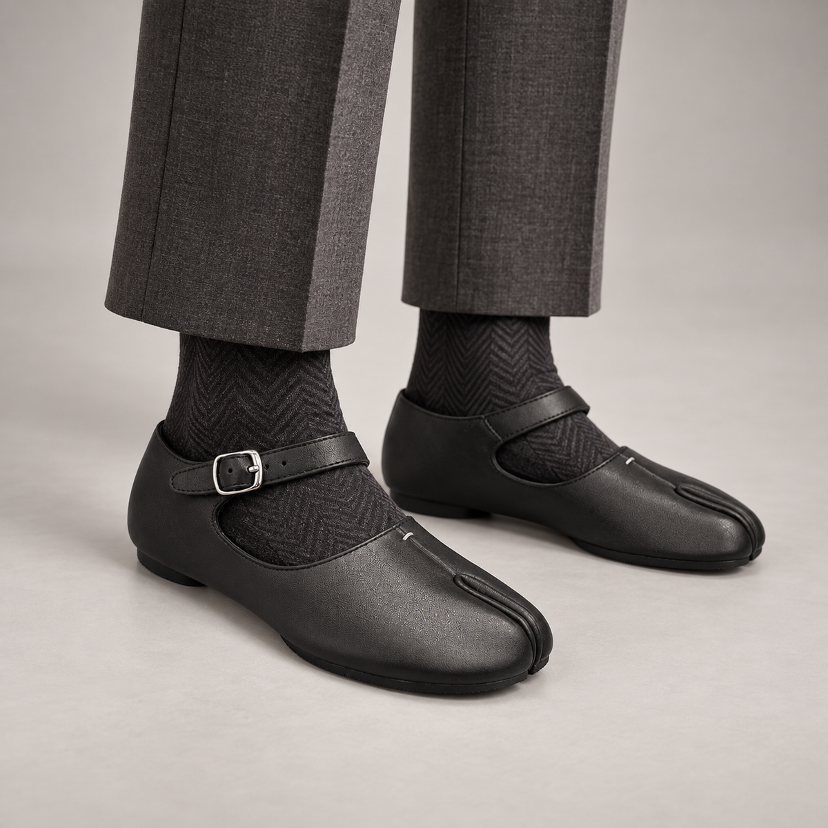 Black Leather Split-Toe Mary Jane Flats worn on foot