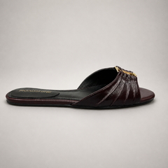 Brown slide sandal side profile showing a pleated forefoot strap
