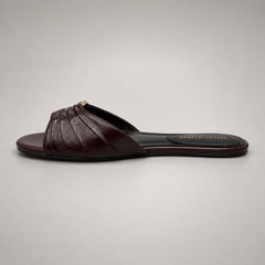 Brown slide sandal opposite side profile showing a pleated forefoot strap