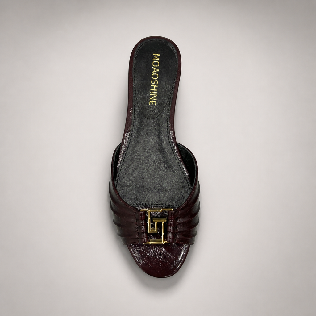 Brown slide sandal top view showing a pleated forefoot strap