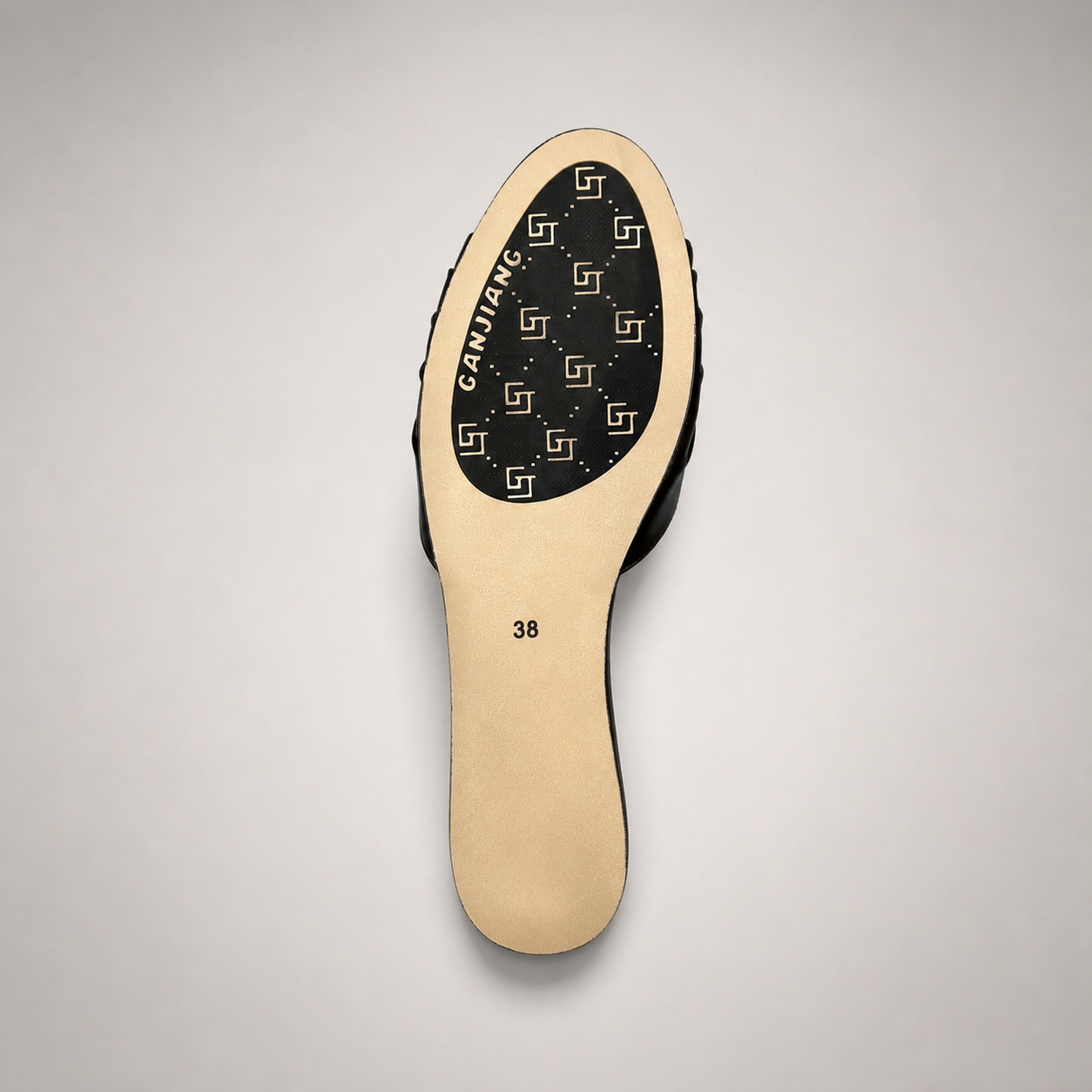 Brown slide sandal outsole view showing the cow leather outsole