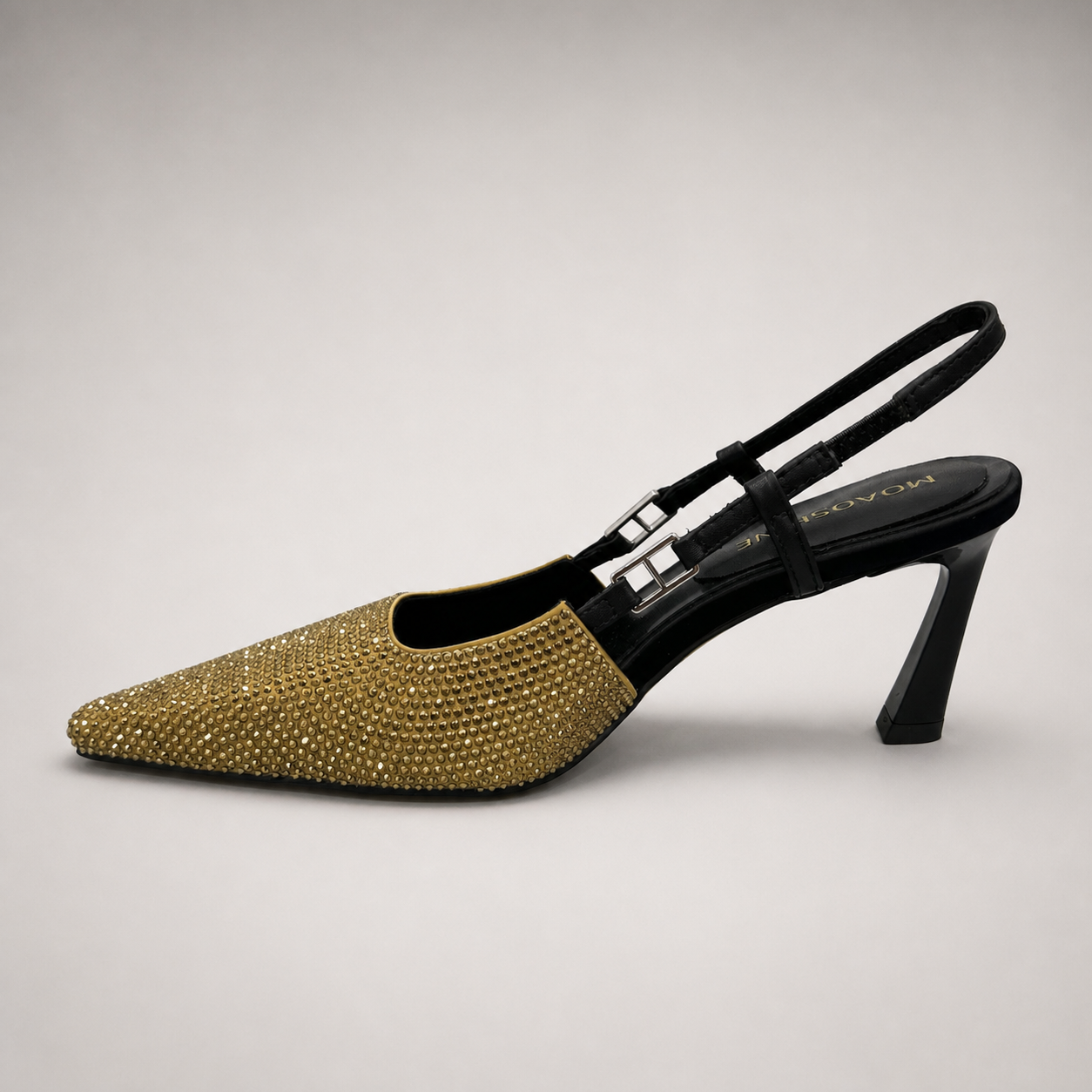 Gold slingback pump opposite side profile showing a pointed toe and double slingback straps