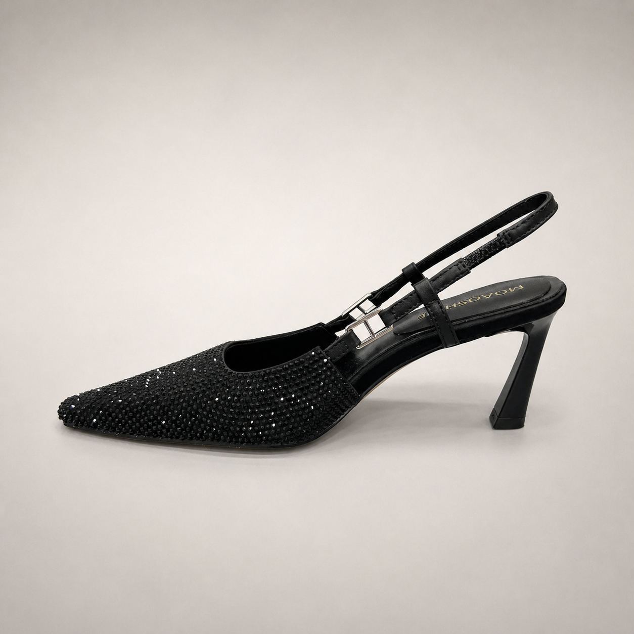 Black slingback pump opposite side profile showing a pointed toe and double slingback straps