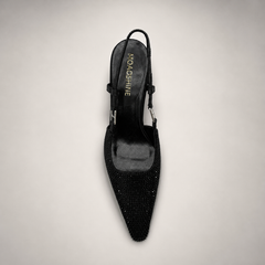 Black slingback pump top view showing a pointed toe and double slingback straps