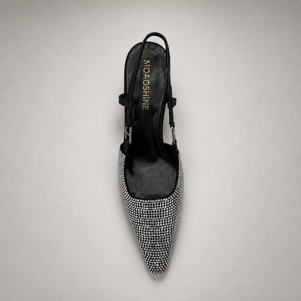 Gray slingback pump top view showing a pointed toe and double slingback straps
