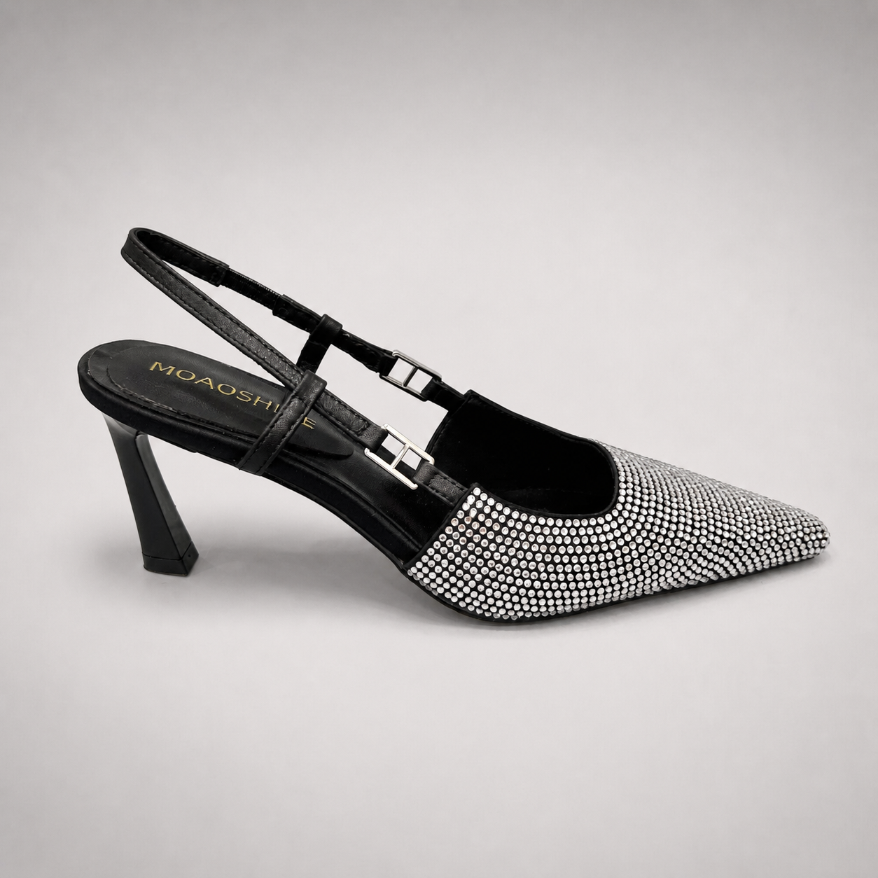 Gray slingback pump opposite side profile showing a pointed toe and double slingback straps