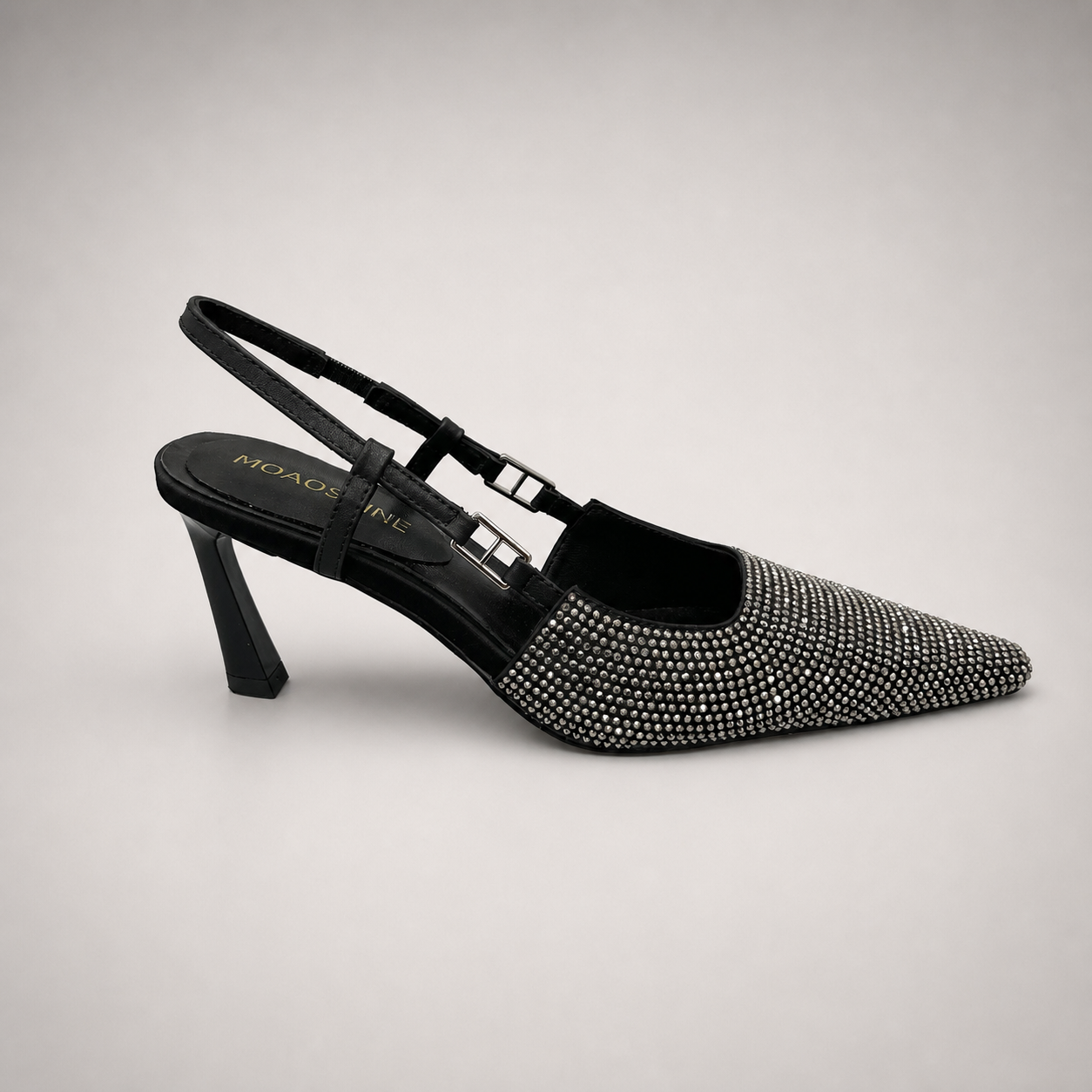 Gray slingback pump side profile showing a pointed toe and double slingback straps