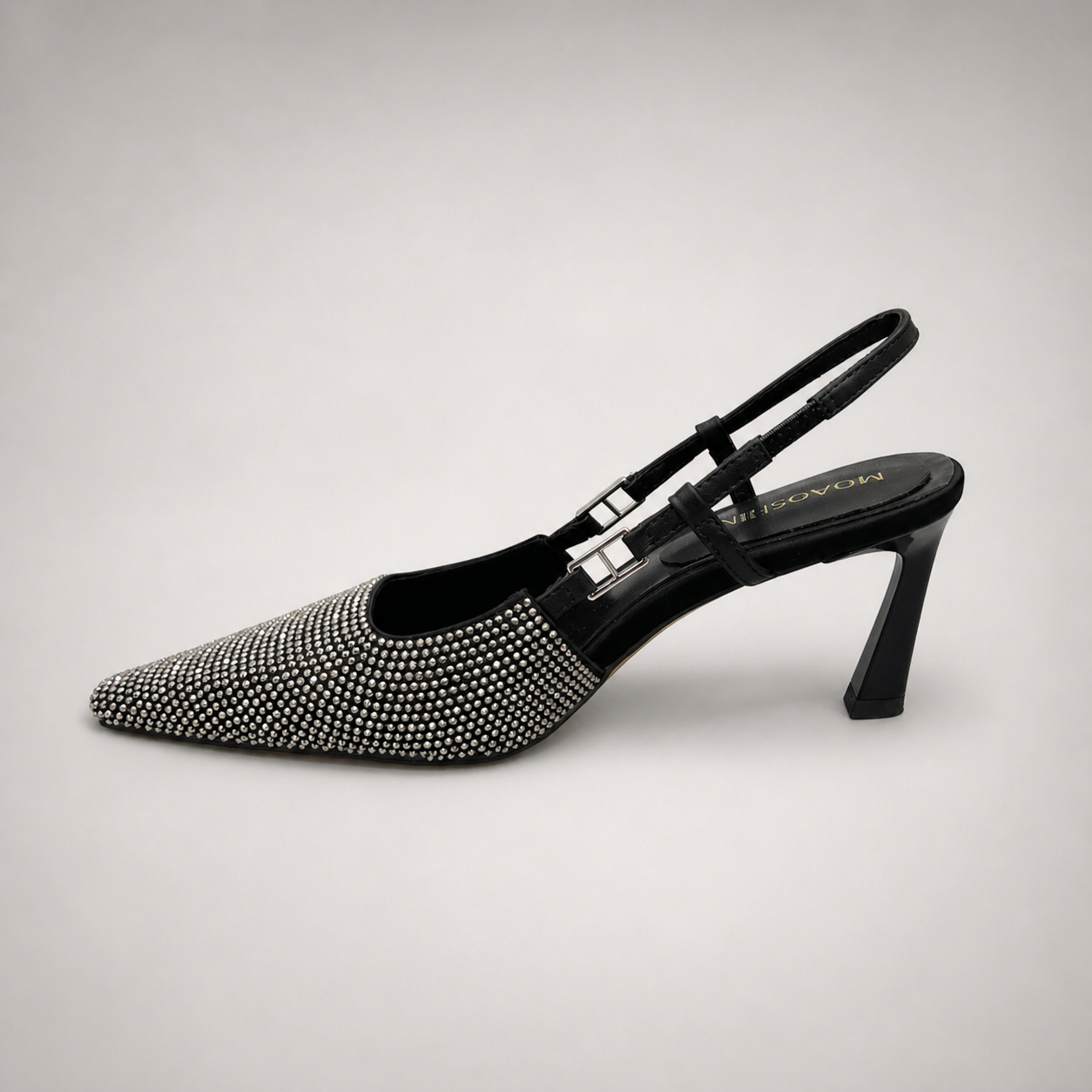 Gray slingback pump opposite side profile showing a pointed toe and double slingback straps