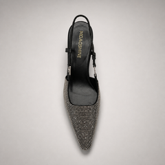 Gray slingback pump outsole view showing the cow leather outsole