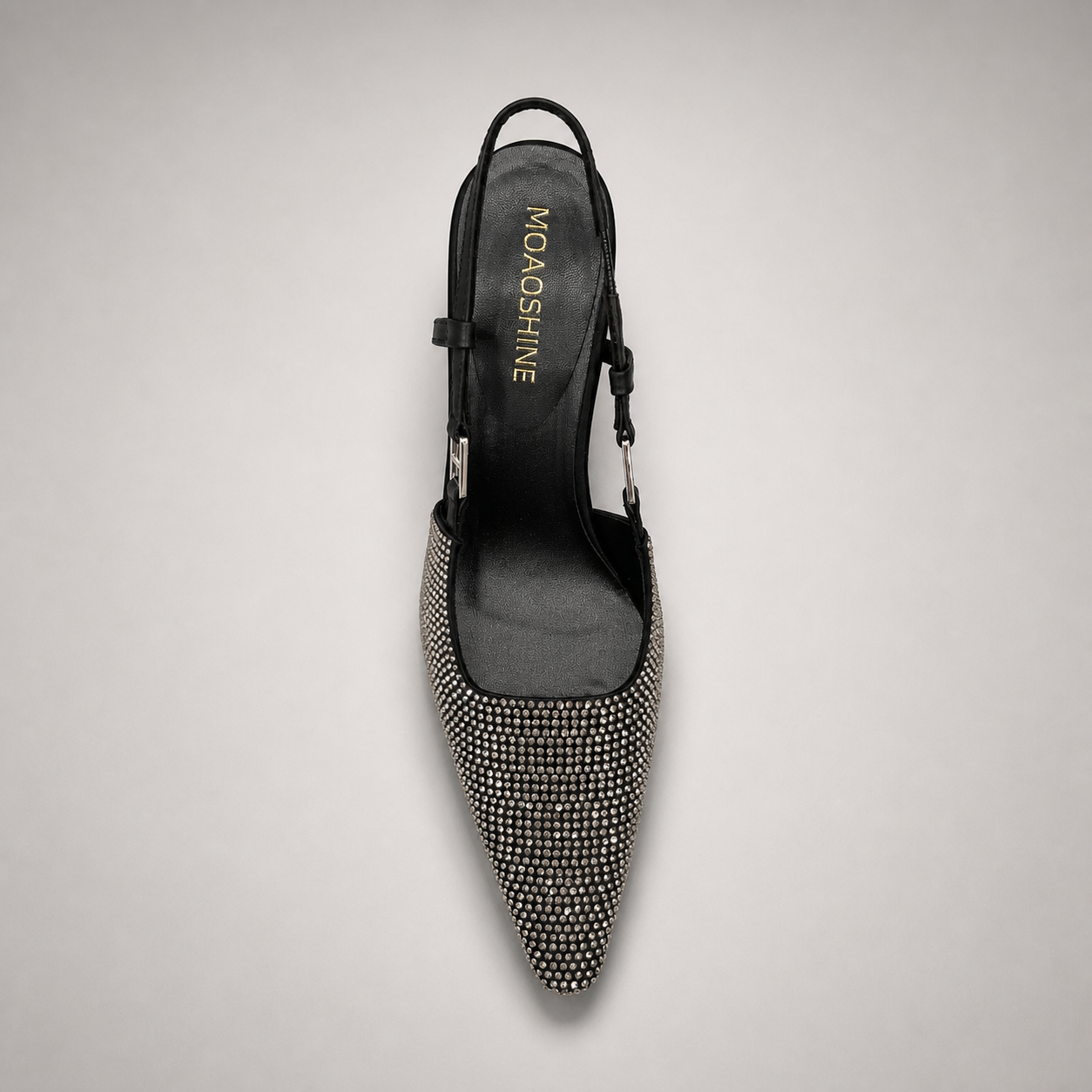Gray slingback pump outsole view showing the cow leather outsole