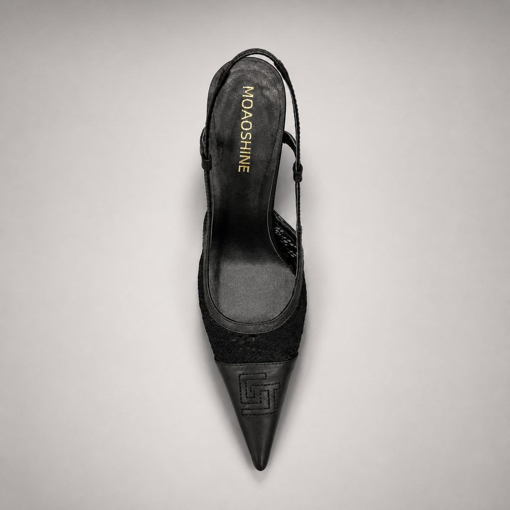 Black slingback pump outsole view showing the cow leather outsole