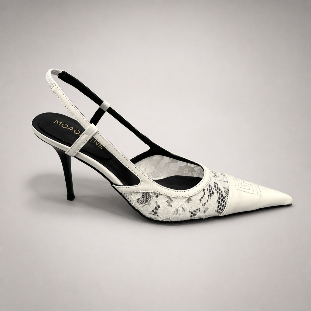 White slingback pump side profile showing a pointed toe and lace-panel upper