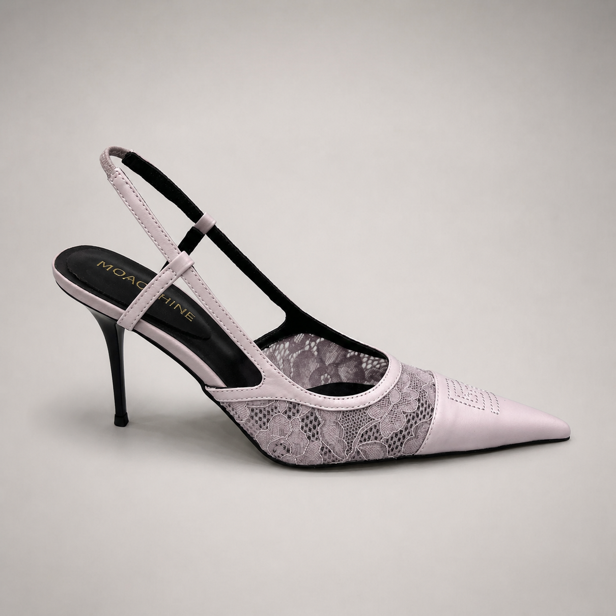 Pink slingback pump side profile showing a pointed toe and lace-panel upper