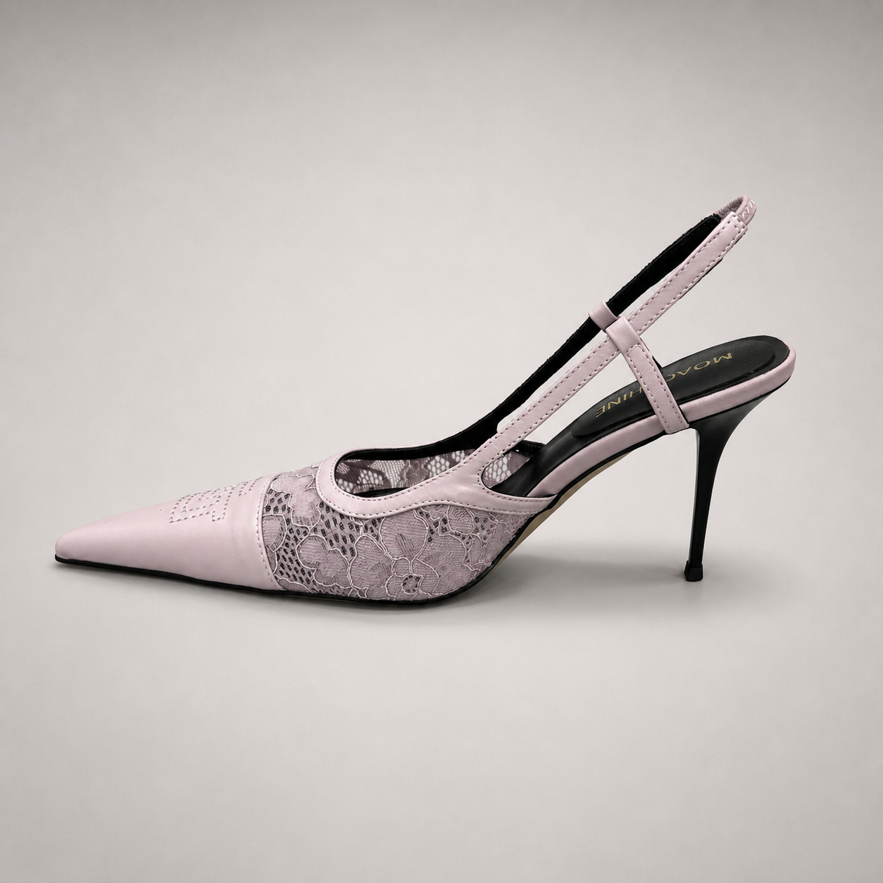Pink slingback pump opposite side profile showing a pointed toe and lace-panel upper