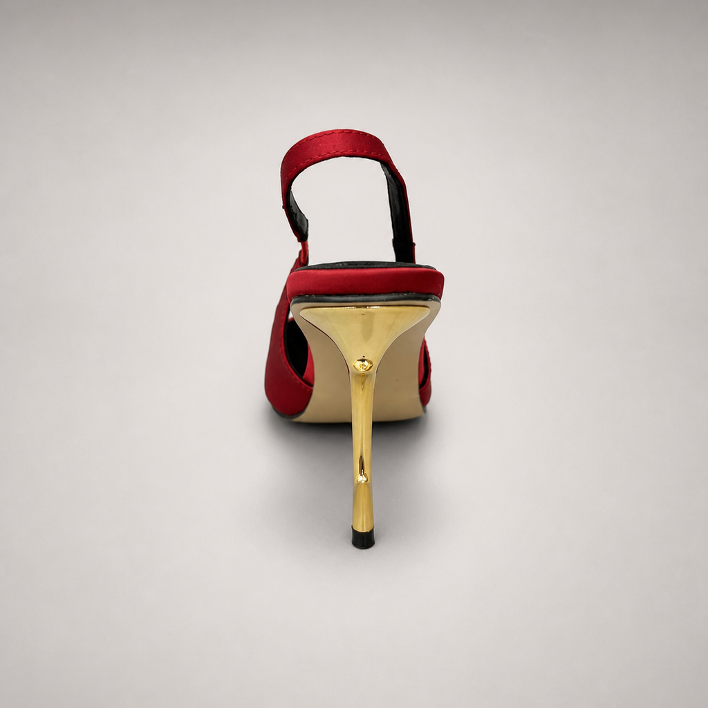 Red slingback pump top view showing a pointed toe and sculpted heel