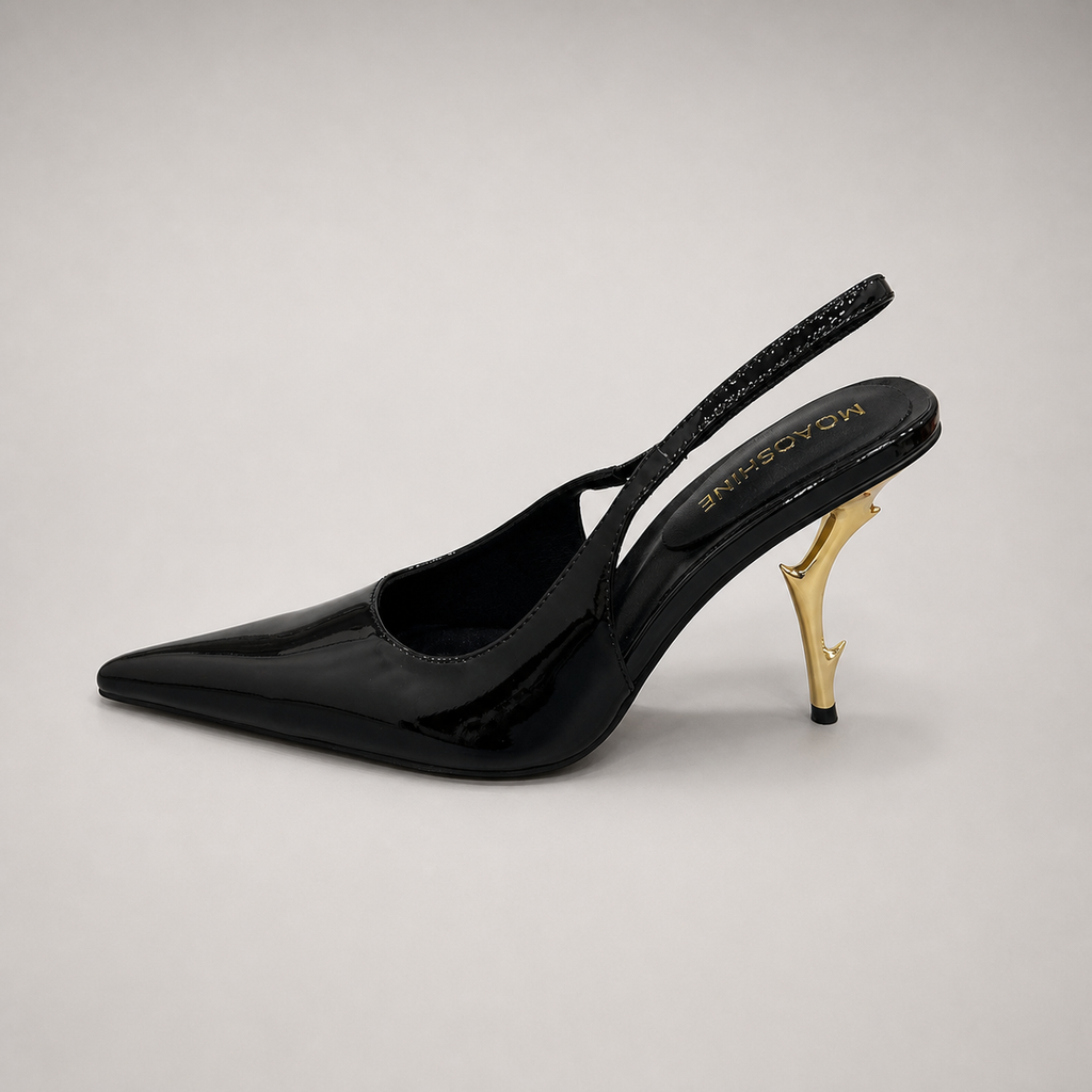 Black slingback pump outsole view showing the cow leather outsole