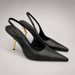 Black slingback pump pair three-quarter view showing a pointed toe and sculpted heel