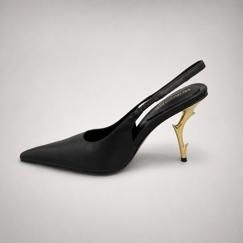 Black slingback pump opposite side profile showing a pointed toe and sculpted heel