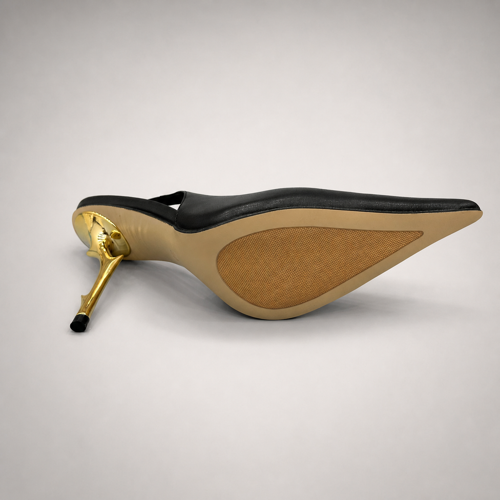 Black slingback pump outsole view showing the cow leather outsole