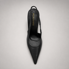 Black slingback pump top view showing a pointed toe and sculpted heel