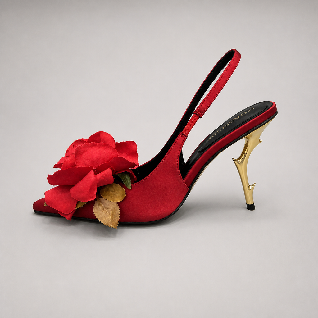 Red slingback pump opposite side profile showing a pointed toe and floral appliqué