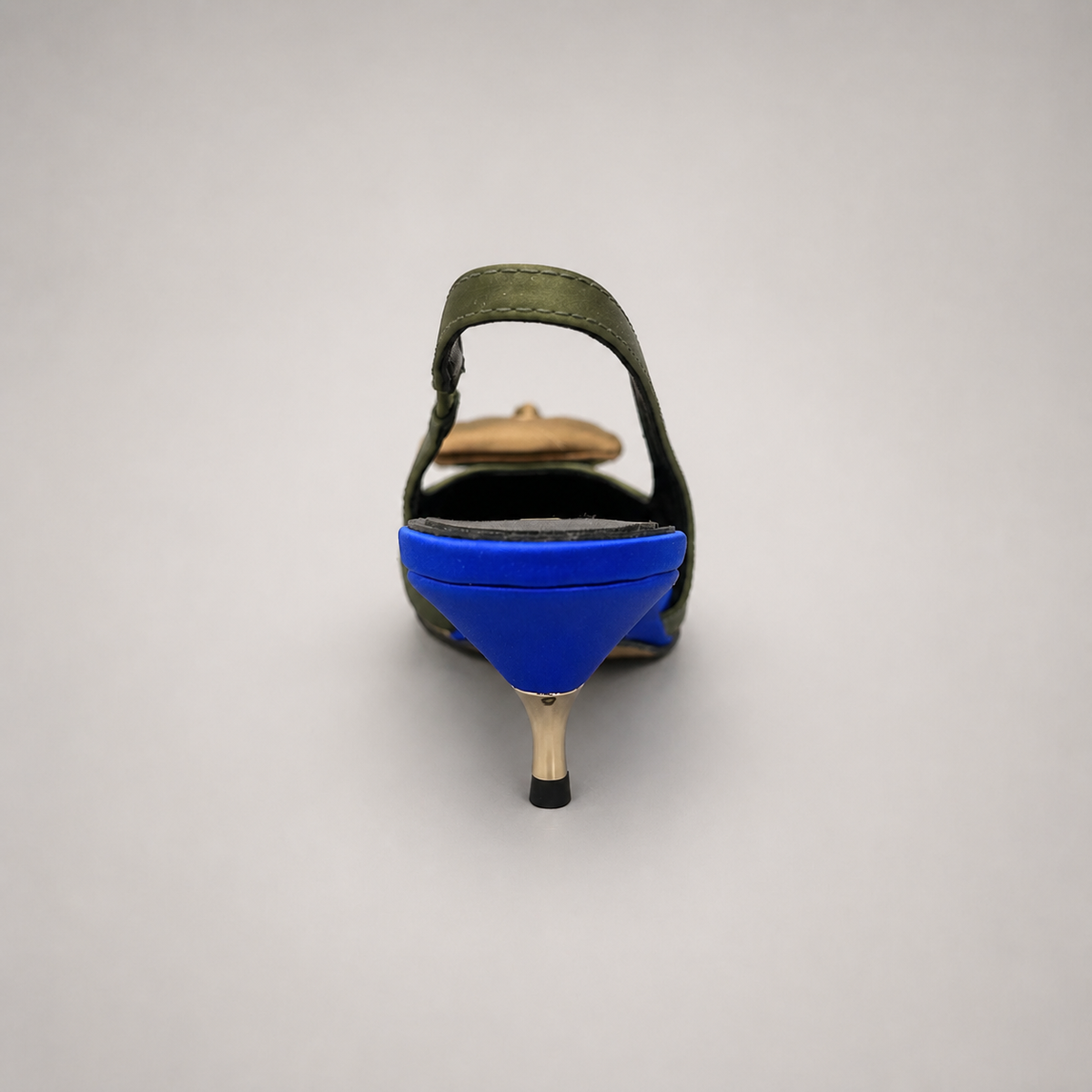 Olive slingback pump rear view showing a pointed toe and bow detail