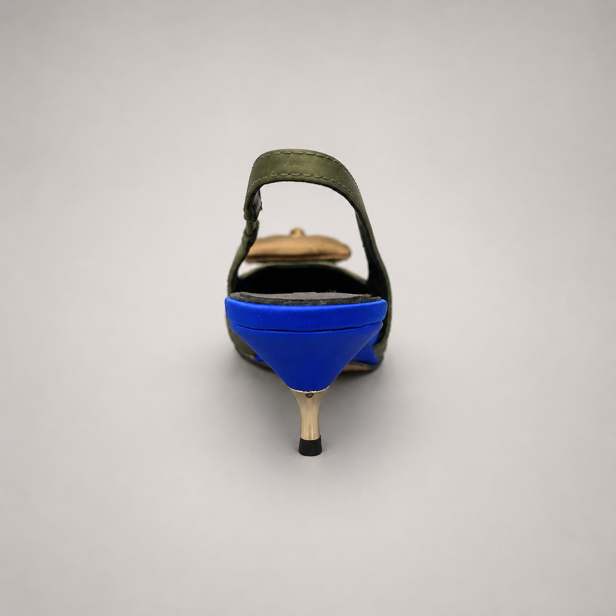 Olive slingback pump rear view showing a pointed toe and bow detail