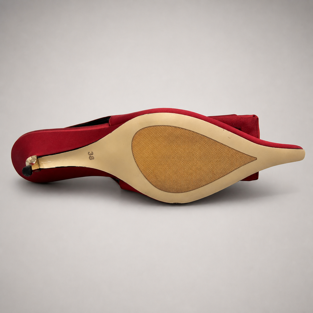 Red slingback pump outsole view showing the cow leather outsole