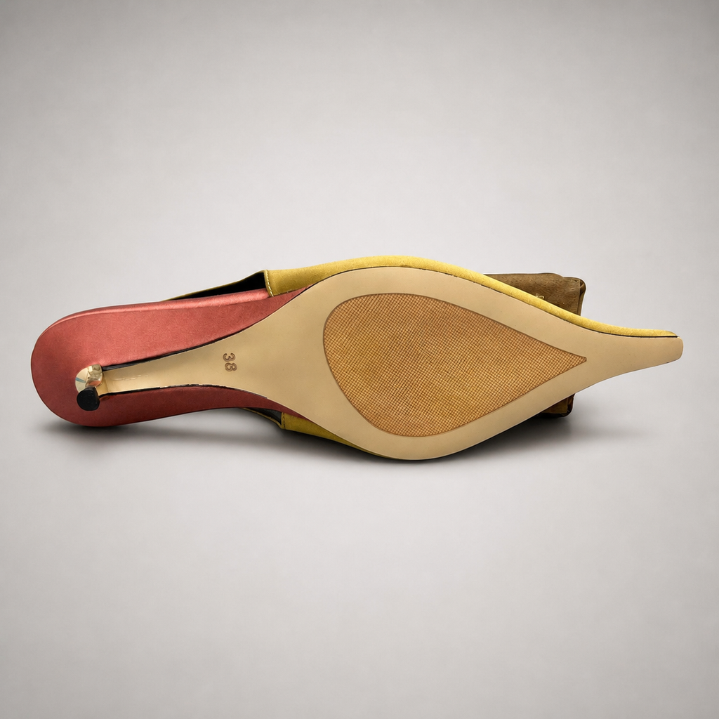 Tan slingback pump outsole view showing the cow leather outsole