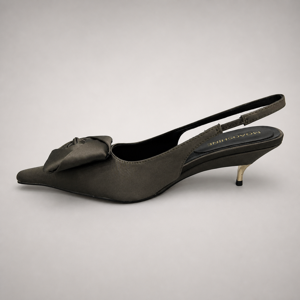 Gray slingback pump opposite side profile showing a pointed toe and bow detail