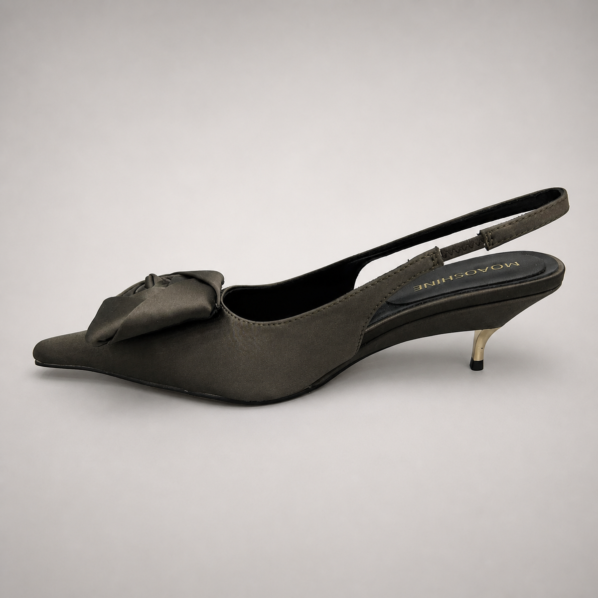 Gray slingback pump opposite side profile showing a pointed toe and bow detail