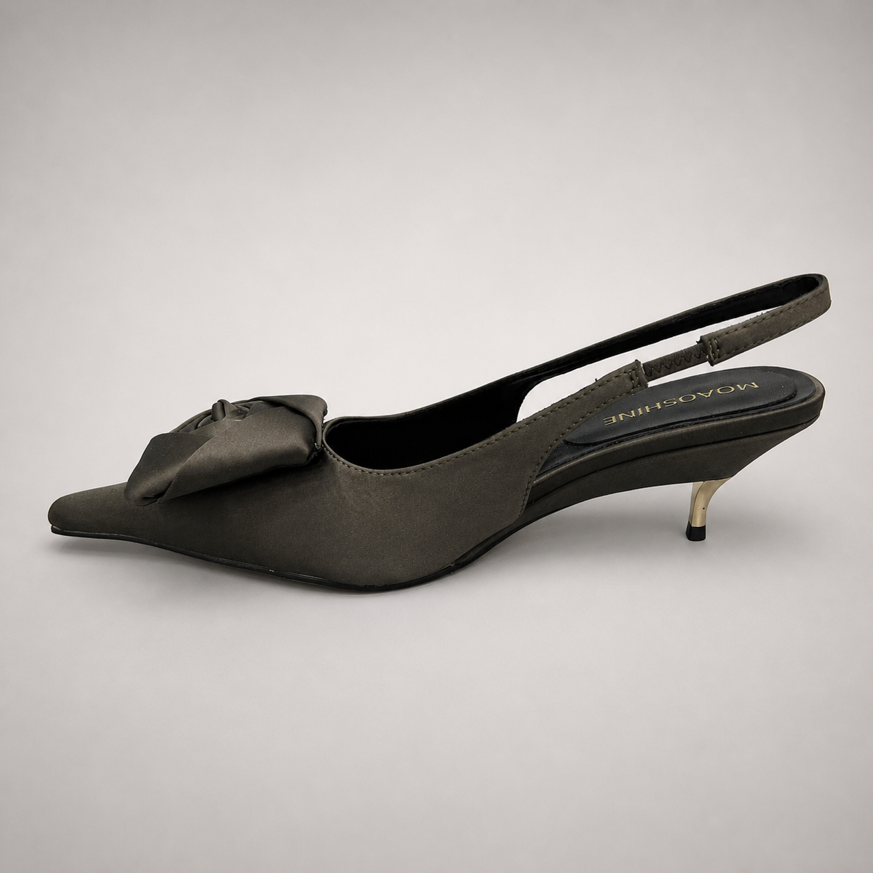 Gray slingback pump opposite side profile showing a pointed toe and bow detail